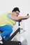 Overweight Woman On Exercise Bike