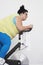 Overweight Woman On Exercise Bike