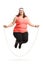 Overweight woman exercising with a skipping rope