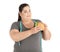 Overweight woman with hamburger