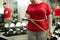 Overweight Woman Measuring Waist in Gym