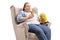 Overweight woman sitting in an armchair eating junk food