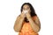 Overweight woman wiping her nose with a tissue