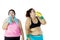 Overweight women drinking water after exercising