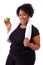 Overweight young black woman holding an apple - African people