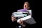 Overworked mature businessman holding pile of folders and looking at camera
