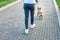 Owner walks in the park with his dog on a leash. Close-up portrait