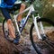 Owning this trail. a male cyclist riding along a mountain bike trail.