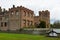Oxburgh Hall, Norfolk, England - corner view with sluice gate