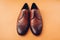 Oxford male brogues shoes. Men`s fashion. Classical brown leather footwear with perforation