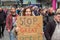 OXFORD STREET, LONDON, ENGLAND- 20 March 2021: Protester holding a sign at the Vigil for the Voiceless anti-lockdown protest