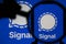 OXFORD, UK - February 2020: Signal private messing logo under magnifying glass