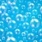 Oxygen bubbles in water blue background