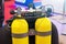 Oxygen cylinders and scuba diving equipment on the diver`s back