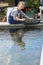 Oyster farmer cleans produce bassin darcachon region france