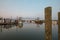 Oyster and fishing trawlers docked at sunset