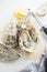 Oyster. Fresh oysters closeup with knife. Oyster dinner in restaurant. Gourmet food. Top view