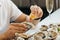 Oyster. Man eating shellfish. Seafood and Mediterranean cuisine with mussels in shell. oyster in luxury restaurant
