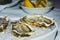 Oysters, ice and lemons, background, close up