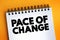 Pace Of Change text on notepad, concept background