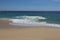 Pacific ocean and beach landscape with golden sands in Los Cabos, Cabo San Lucas, Mexico