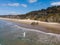 Pacific ocean beach with rocks, aerial view, landscape for travel agencies, vacation and vacation