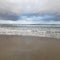 Pacific ocean beach rolling waves horizon line