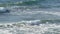 Pacific ocean big waves splashing, California coast seascape USA. Water surface texture and sea foam