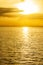Pacific ocean expanse with sunrise, sunrays, cloouds