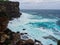 Pacific Ocean Storm Waves Crashing on Sandstone Cliff, Australia