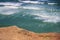 Pacific ocean view in Lima, heart symbol made of stones on the beach