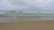 Pacific Ocean waves on the beach in the town of Hoi An, Vietnam