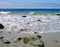 Pacific Ocean waves running up beach