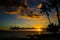 Pacific Sunset and Coconut Palm Trees Silhouette