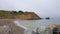 Pacifica, California - August 2017: People enjoying time on the beach and the ocean in Pacific, California