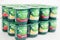 Pack of Activia exclusive live yogurt cultures with fruits on white background