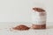 Pack of buckwheat on a white table. White medical mask