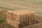 Pack compressed hay on mown grassland