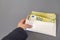 pack of euro bills in an envelope.Recalculation of money. Envelope with money.Euro banknotes in a white container on a