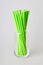 Pack of green disposable paper straws for party cocktails