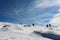 A pack of hikers walking down from Matagalls peak summit on a winter sunny day, Montseny mountains, Barcelona