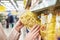 Pack of pasta in hands of buyer at store