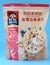 pack of Quaker crispy fruity oats on blue background