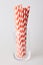 Pack of red and white striped disposable paper straws for party cocktails