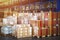 Package Boxes Stacked on Pallets in Storage Warehouse. Storehouse Distribution Storage Tall Shelf. Supply Chain