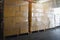 Package Boxes Wrapped Plastic Stacked on Pallets. Storage Warehouse, Storehouse Distribution. Supply Chain. Warehouse Logistics.