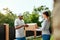 Package Delivering. Delivery Man Delivering Box To Woman