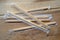 Package of readymade bamboo chopsticks on wooden background