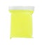 Package of yellow play dough on white background, top view