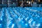 Packaged blue plastic water jugs are in the finished product warehouse